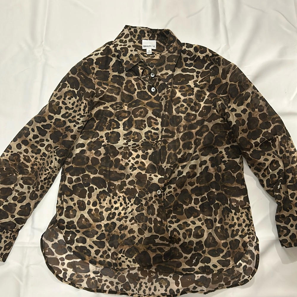 Animal print shirt in small.